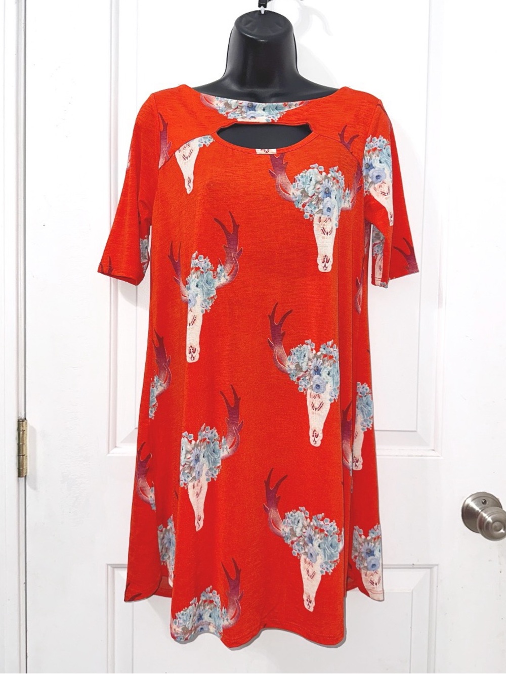 Auditions shift dress bull skull and floral print on a vibrant orange-red